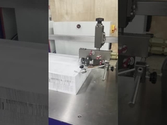 横折りA4紙を折りたたむ機械